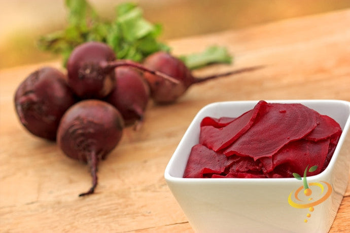 Early Wonder beet seeds from SeedsNow, showing vibrant green and purple beetroot seedlings on a gardening tray.