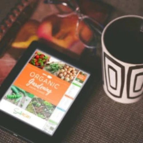 Screenshot of the free organic gardening grow guides eBook from SeedsNow.com, showing the cover and gardening tips.